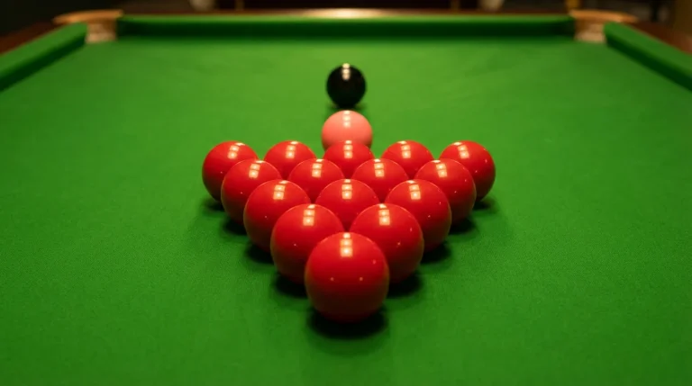 Billes de snooker alignées sur le tapis vert d'une table de snooker professionnelle